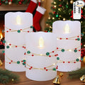 Christmas Flameless Candles by Silverstro
