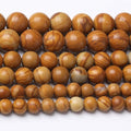 Yellow Woodgrain 4mm Stone Beads by Unknown