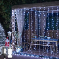 JMEXSUSS 900LED Christmas Curtain Lights Outdoor by JMEXSUSS