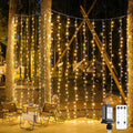 JMEXSUSS 900 LED Outdoor Christmas Curtain Lights, 9.5x29.5ft Christmas Lights by JMEXSUSS